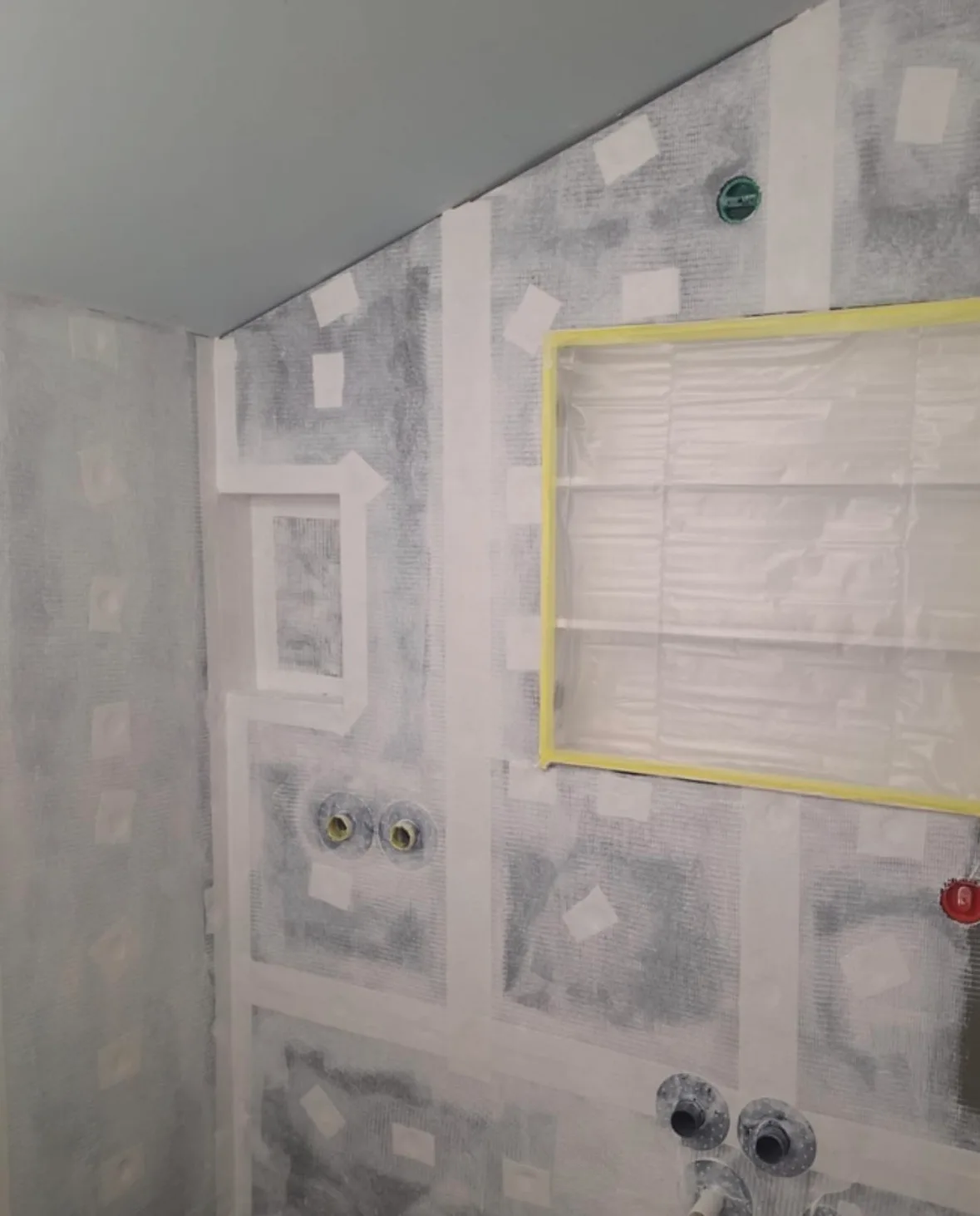 Interior renovation with drywall installation underway
