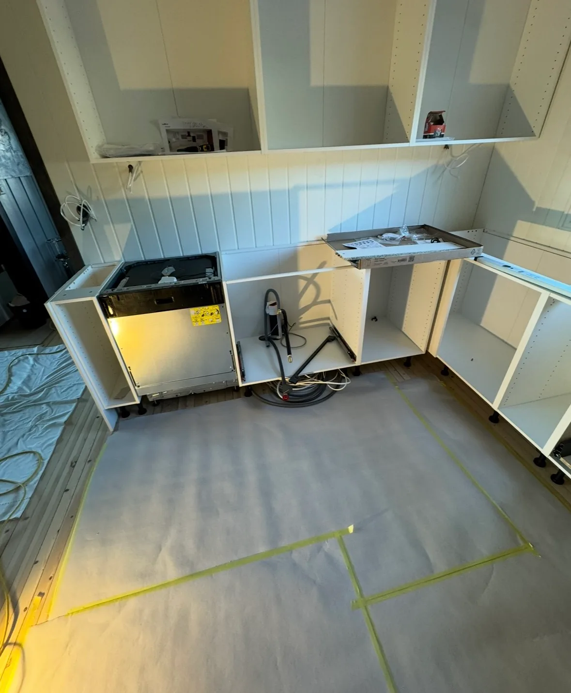 Modern kitchen cabinet installation in progress